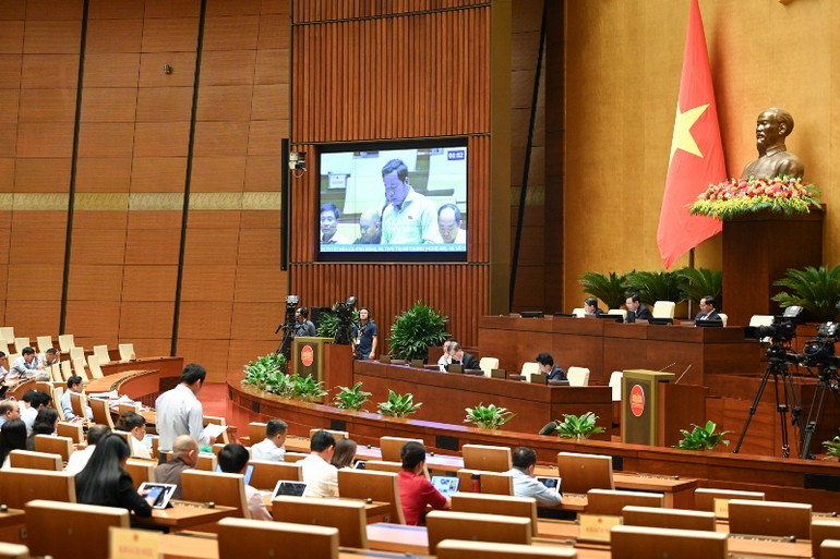 Quang cảnh phiên thảo luận tại hội trường của Quốc hội chiều 20/6. (Ảnh: DUY LINH)