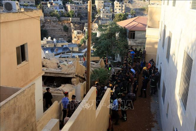 Hiện trường vụ sập tòa nhà 4 tầng ở thủ đô Amman, Jordan ngày 13/9/2022. Ảnh: THX/TTXVN Hiện trường vụ sập tòa nhà 4 tầng ở thủ đô Amman, Jordan ngày 13/9/2022. Ảnh: THX/TTXVN