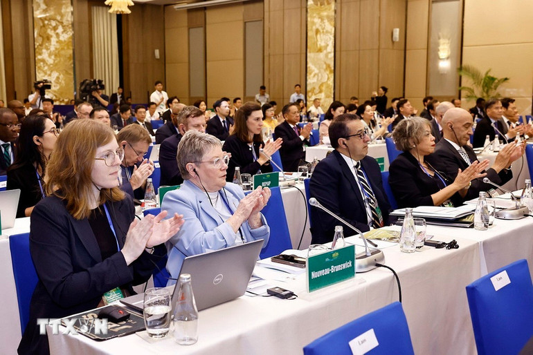 Đại biểu dự khai mạc diễn đàn. (Ảnh: TTXVN)