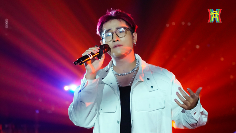 Chương trình có sự tham gia của nhiều ca sĩ vừa đoạt giải cuộc thi Tiếng hát Hà Nội 2024. Trong ảnh là ca sĩ Trịnh Quang Minh - giải Nhất cuộc thi. Chương trình có sự tham gia của nhiều ca sĩ vừa đoạt giải cuộc thi Tiếng hát Hà Nội 2024. Trong ảnh là ca sĩ Trịnh Quang Minh - giải Nhất cuộc thi.