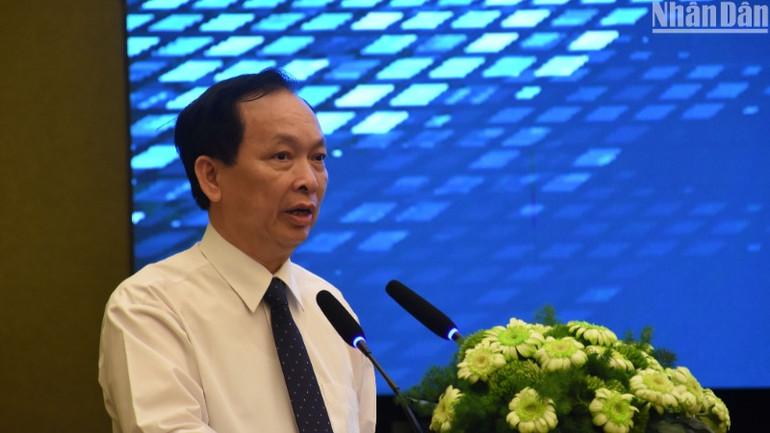 Phó Thống đốc Thường trực Ngân hàng Nhà nước Đào Minh Tú phát biểu khai mạc diễn đàn. (Ảnh: ANH ĐÀO)