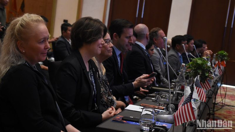 Các đại biểu tham dự khai mạc hội nghị Mini-IDEC sáng 26/3.