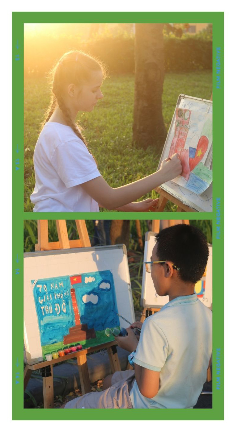 Các em học sinh bên tác phẩm của mình.