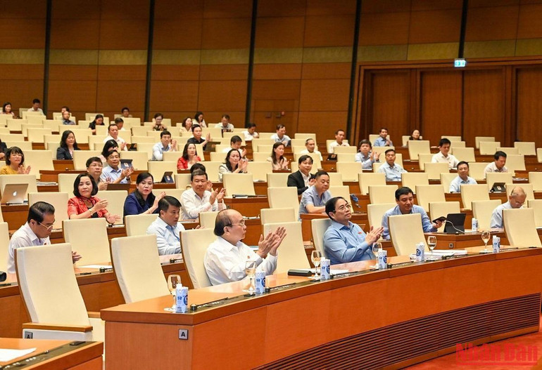 Chủ tịch nước Nguyễn Xuân Phúc, Thủ tướng Chính phủ Phạm Minh Chính và các đại biểu tham dự Hội nghị. (Ảnh: DUY LINH)