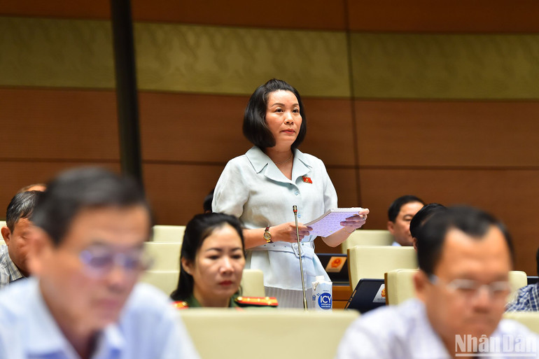 Đại biểu Nguyễn Minh Tâm (đoàn Quảng Bình) phát biểu ý kiến. (Ảnh: THỦY NGUYÊN) Đại biểu Nguyễn Minh Tâm (đoàn Quảng Bình) phát biểu ý kiến. (Ảnh: THỦY NGUYÊN)