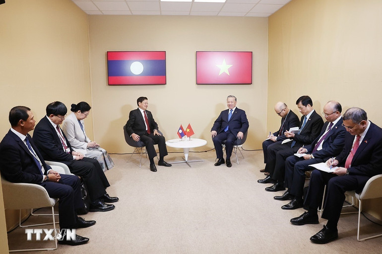 Quang cảnh cuộc gặp. (Ảnh: TTXVN)