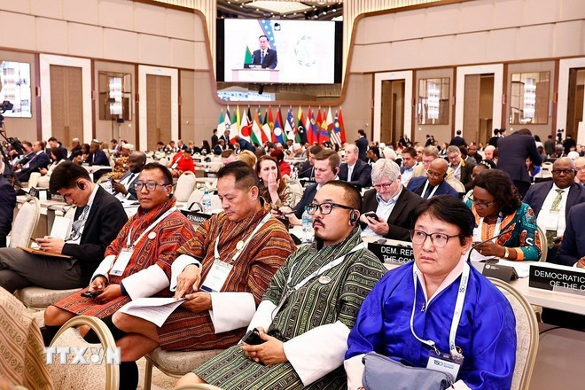 Đại biểu nghe Chủ tịch Quốc hội Trần Thanh Mẫn phát biểu. (Ảnh: TTXVN)