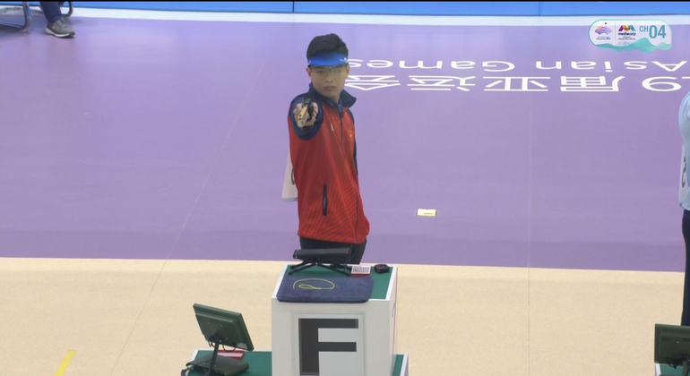 Xạ thủ Phạm Quang Huy giành HCV ASIAD 19 trong sự ngỡ ngàng. (Ảnh: N.T)