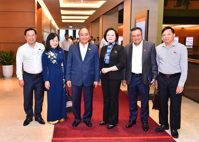 Chủ tịch nước Nguyễn Xuân Phúc cùng các đại biểu Quốc hội tại Phiên chất vấn và trả lời chất vấn chiều 3/11.