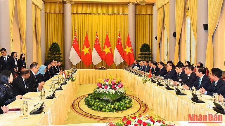 Quang cảnh buổi hội đàm giữa Chủ tịch nước Nguyễn Xuân Phúc và Tổng thống Cộng hòa Singapore Halimah Yacob. (Ảnh: Thủy Nguyên)