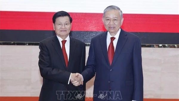 Tổng Bí thư Tô Lâm và Tổng Bí thư, Chủ tịch nước Lào Thongloun Sisoulith. (Ảnh: Thống Nhất/TTXVN)