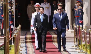 Tổng thống Ai Cập Abdel Fattah El-Sisi đón Chủ tịch nước Lương Cường. (Ảnh: Lâm Khánh/TTXVN)