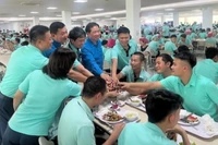 Bữa cơm Công đoàn năm 2025 tại Công ty TNHH Canon Việt Nam. (Ảnh: KIỀU VŨ)