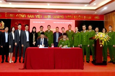 Quang cảnh lễ ký kết giữa Viện Khoa học hình sự và Trung tâm Mã số, mã vạch quốc gia.