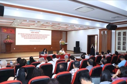 Hội nghị lấy ý kiến góp ý vào dự thảo văn kiện Đại hội Đảng bộ thành phố Hà Nội lần thứ 18. (Ảnh: QUANG THÁI).