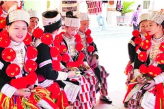 Trang phục của người phụ nữ Dao đỏ.