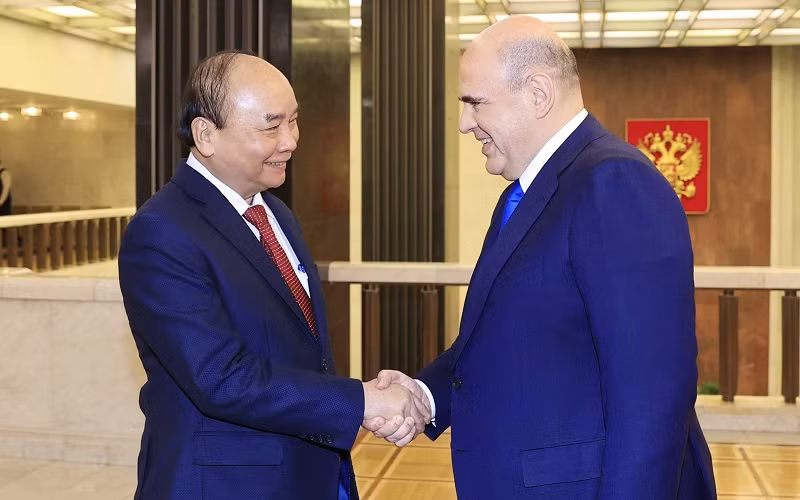 Chủ tịch nước Nguyễn Xuân Phúc hội kiến Thủ tướng Liên bang Nga Mikhail Vladimirovich Mishustin. (Ảnh: TTXVN)