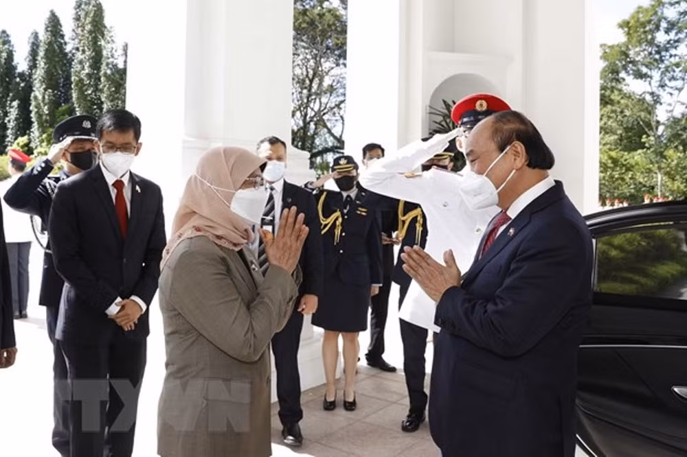 Lễ đón Chủ tịch nước Nguyễn Xuân Phúc thăm cấp Nhà nước tới Singapore -0