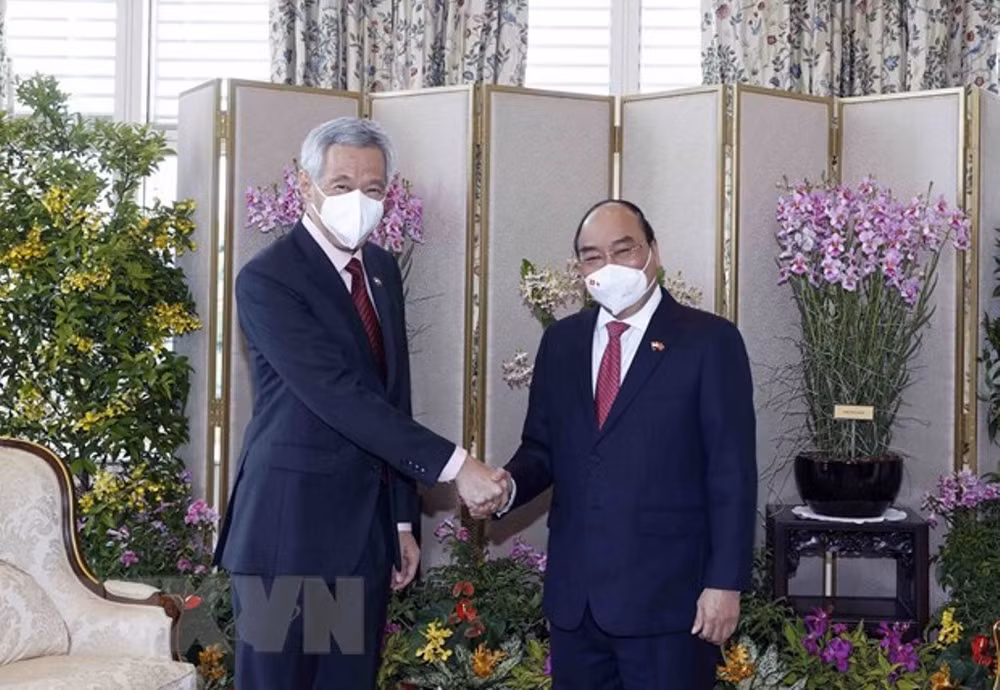 Lễ đón Chủ tịch nước Nguyễn Xuân Phúc thăm cấp Nhà nước tới Singapore -0