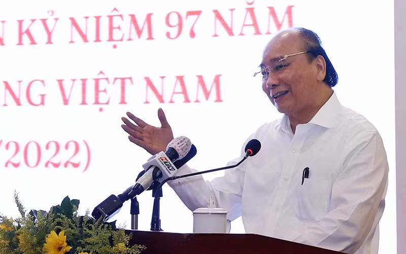Chủ tịch nước Nguyễn Xuân Phúc phát biểu tại buổi gặp mặt các cơ quan báo chí tại Thành phố Hồ Chí Minh. (Ảnh: TTXVN)