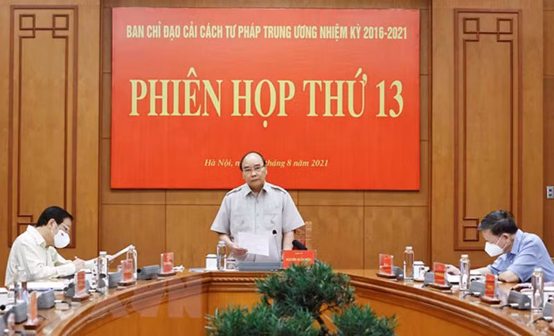 Chủ tịch nước Nguyễn Xuân Phúc, Trưởng Ban Chỉ đạo Cải cách Tư pháp Trung ương phát biểu tại phiên họp. (Ảnh: TTXVN)