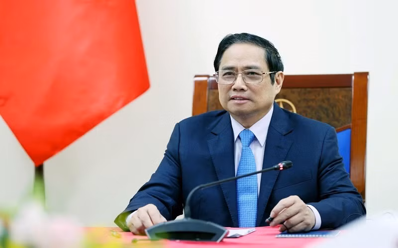 Thủ tướng Phạm Minh Chính điện đàm với Thủ tướng Italia Mario Draghi. (Ảnh: TTXVN)