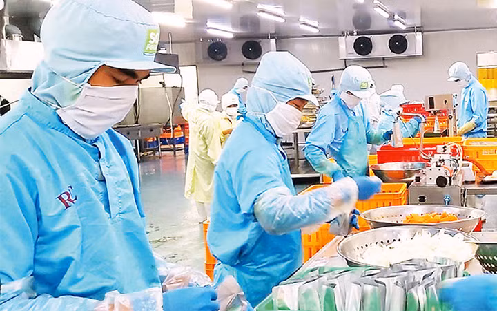 Lao động tại Công ty Sài Gòn Food. (Ảnh minh họa: Quang Quý)