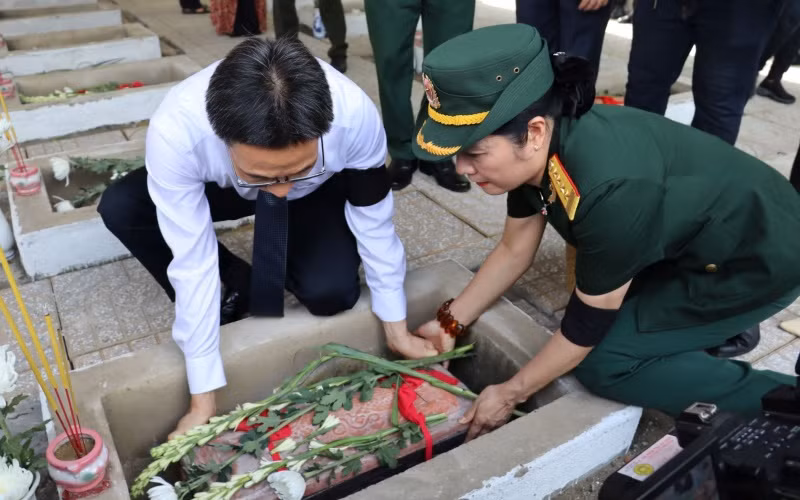 Truy điệu, an táng 28 hài cốt liệt sĩ Đoàn 10 Đặc công Rừng Sác -0