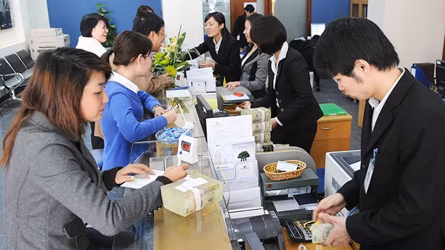 Từ đầu tháng 4 tới nay, tỷ giá đã dần ổn định, giá VND đã hồi phục dần. Ảnh: NAM ANH