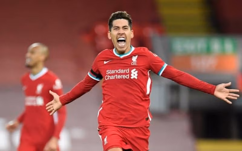 Firmino ghi bàn quyết định, giúp Liverpool thắng Tottenham 2-1.