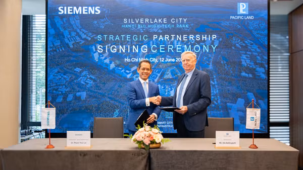 Lãnh đạo Công ty TNHH Siemens và Công ty cổ phần Pacific Land tại lễ ký Biên bản ghi nhớ hợp tác.