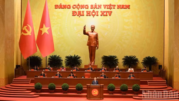 Tổng Bí thư Tô Lâm Báo cáo về các văn kiện trình Đại hội XIV Đảng Cộng sản Việt Nam tại phiên khai mạc Đại hội đại biểu toàn quốc lần thứ XIV Đảng Cộng sản Việt Nam. (Ảnh: TRẦN HẢI)