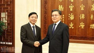 Phó Thủ tướng Trần Hồng Hà và Phó Ủy viên trưởng Nhân đại toàn quốc Trung Quốc Vương Đông Minh.
