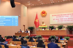 Quang cảnh ngày làm việc thứ hai của kỳ họp thứ 29 của Hội đồng nhân dân thành phố Hà Nội