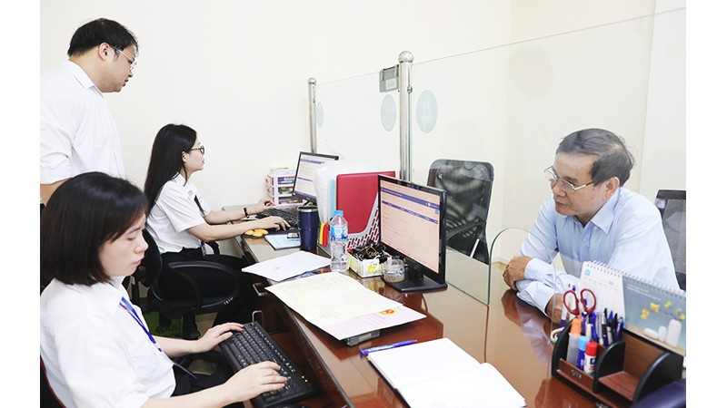 Sự đồng hành và hỗ trợ từ chính quyền 2 cấp đóng vai trò then chốt trong việc thúc đẩy hoạt động sản xuất, kinh doanh của doanh nghiệp. Ảnh: ANH QUÂN 231.jpg