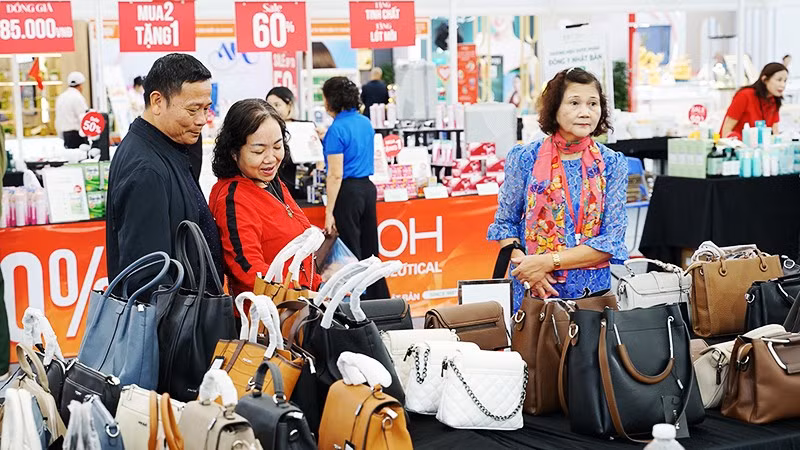 Đẩy mạnh các hoạt động xúc tiến thương mại nhằm kích cầu tiêu dùng trong nước. Ảnh: NAM NGUYỄN