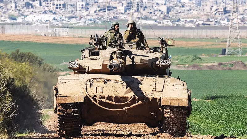 Xe tăng Israel tại biên giới với Dải Gaza. Ảnh: REUTERS