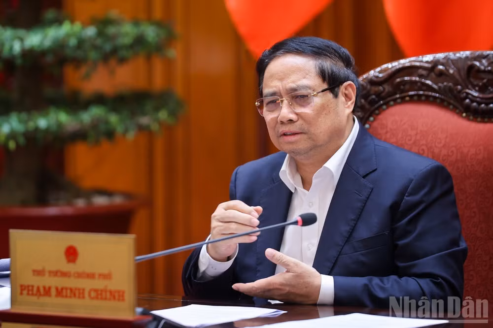 Thủ tướng Chính phủ Phạm Minh Chính chủ trì cuộc họp về điều hành kinh tế vĩ mô. (Ảnh: TRẦN HẢI) 