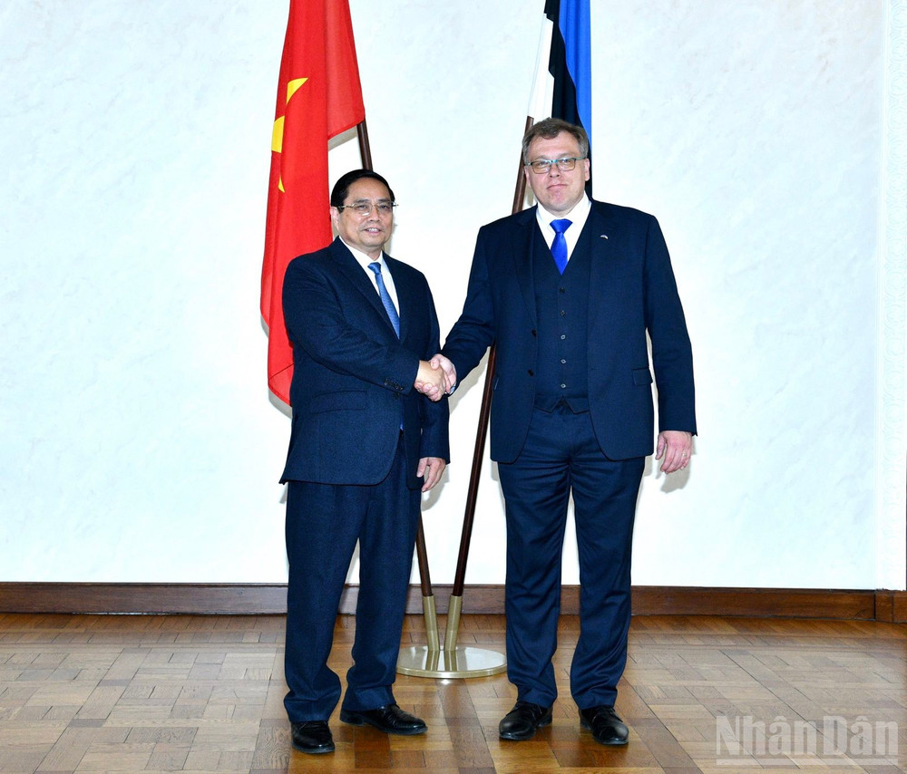 Thủ tướng Chính phủ Phạm Minh Chính và Chủ tịch Quốc hội Estonia Lauri Hussar. (Ảnh: THANH GIANG) ndo_br_b1.jpg