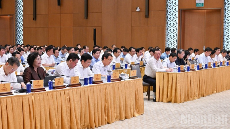 Các đồng chí lãnh đạo, đại biểu tham dự hội nghị. (Ảnh: TRẦN HẢI) ndo_br_a4-1346.jpg