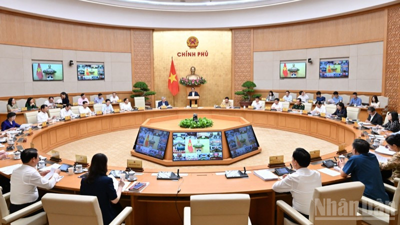Quang cảnh hội nghị trực tuyến của Chính phủ với các địa phương. (Ảnh: Trần Hải) ndo_br_b1-7624.jpg