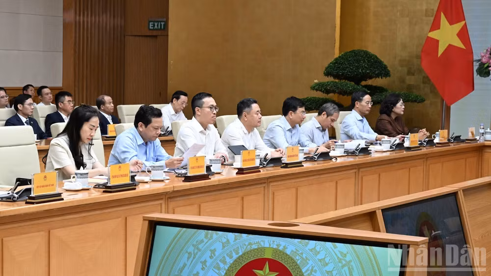Lãnh đạo các bộ, ngành, cơ quan tham dự cuộc làm việc. (Ảnh: TRẦN HẢI)