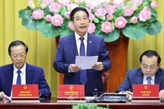 Phó Chủ nhiệm Văn phòng Chủ tịch nước Phạm Thanh Hà chủ trì Họp báo. (Ảnh: TTXVN)