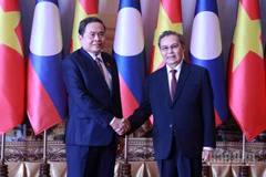 Chủ tịch Quốc hội Trần Thanh Mẫn hội kiến Chủ tịch Quốc hội Lào Saysomphone Phomvihane. (Ảnh: TRỊNH DŨNG - DUY TOÀN)