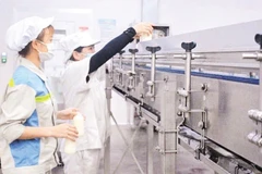 Công nghệ sản xuất sữa theo tiêu chuẩn hiện đại tại Vinamilk.