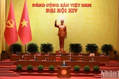 Tổng Bí thư Tô Lâm Báo cáo về các văn kiện trình Đại hội XIV Đảng Cộng sản Việt Nam tại phiên khai mạc Đại hội đại biểu toàn quốc lần thứ XIV Đảng Cộng sản Việt Nam. (Ảnh: TRẦN HẢI)