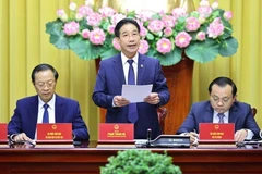Phó Chủ nhiệm Văn phòng Chủ tịch nước Phạm Thanh Hà chủ trì Họp báo. (Ảnh: TTXVN)