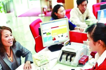 Dòng kiều hối chuyển về Thành phố Hồ Chí Minh tiếp tục tăng mạnh, trở thành “nguồn lực vàng” tăng trưởng kinh tế. (Ảnh THẾ ANH)