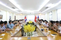 Đông đảo cán bộ, nhân viên Đại sứ quán, đại diện cộng đồng kiều bào, doanh nghiệp, lưu học sinh tại Campuchia tham gia lễ quyên góp. (Ảnh: HUY VŨ)