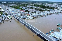 Trục tuyến đông-tây, đoạn cầu bắc qua sông Ông Đốc tại miền biển thị trấn Sông Đốc, huyện Trần Văn Thời, tỉnh Cà Mau.